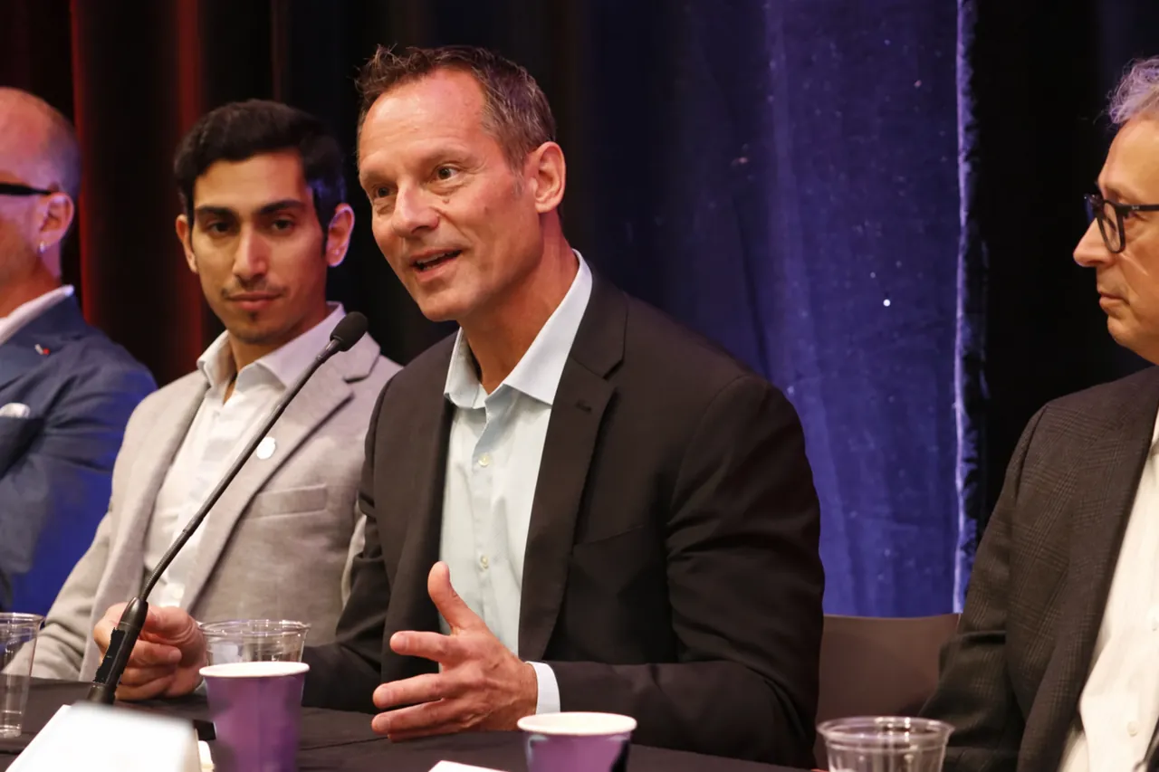People in conversation at a business event
